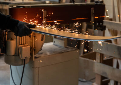 Hinterland Skis on grinder with sparks Salt Lake - branding photography