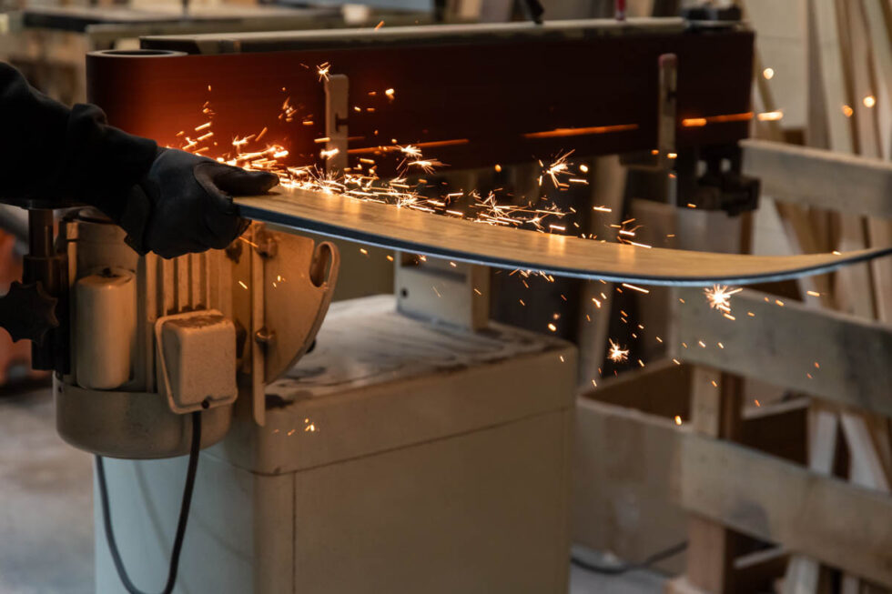 Hinterland Skis on grinder with sparks Salt Lake - branding photography