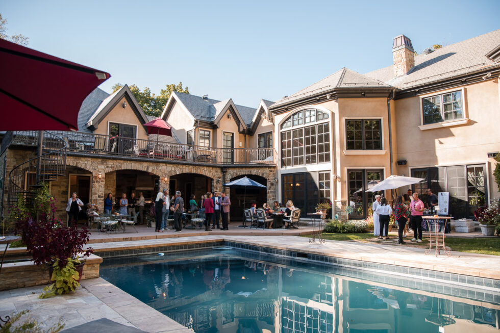 Corporate event photography of Millcreek City Lifestyle event by pool